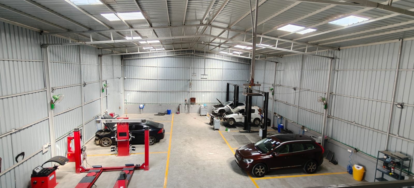 Inside view of Torque Experts multi-brand car service workshop, Madhapur