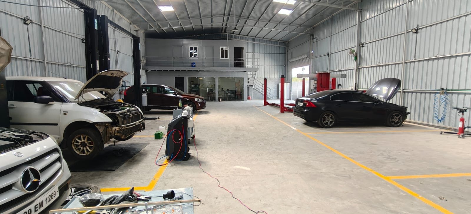 Workshop floor at Torque Experts auto service centre, Madhapur Hyderabad